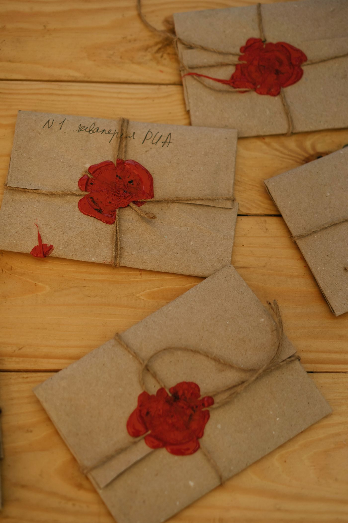 Recycled-paper envelopes with string