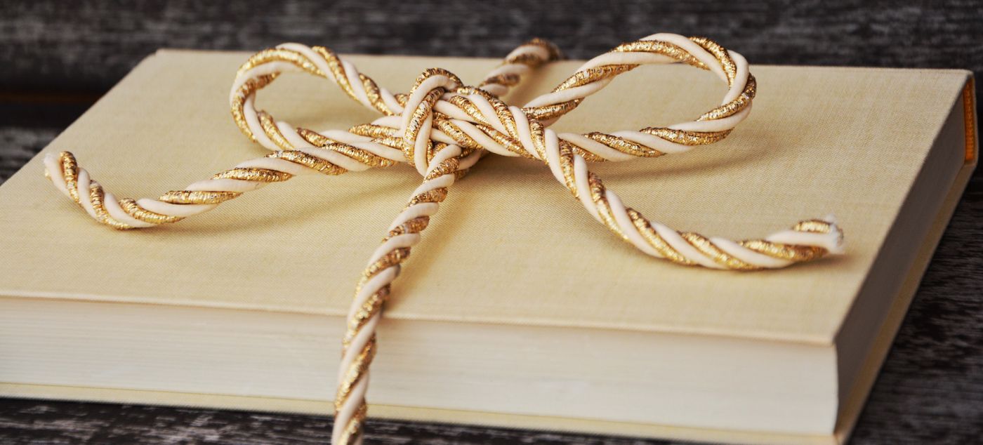 A book tied with a ribbon