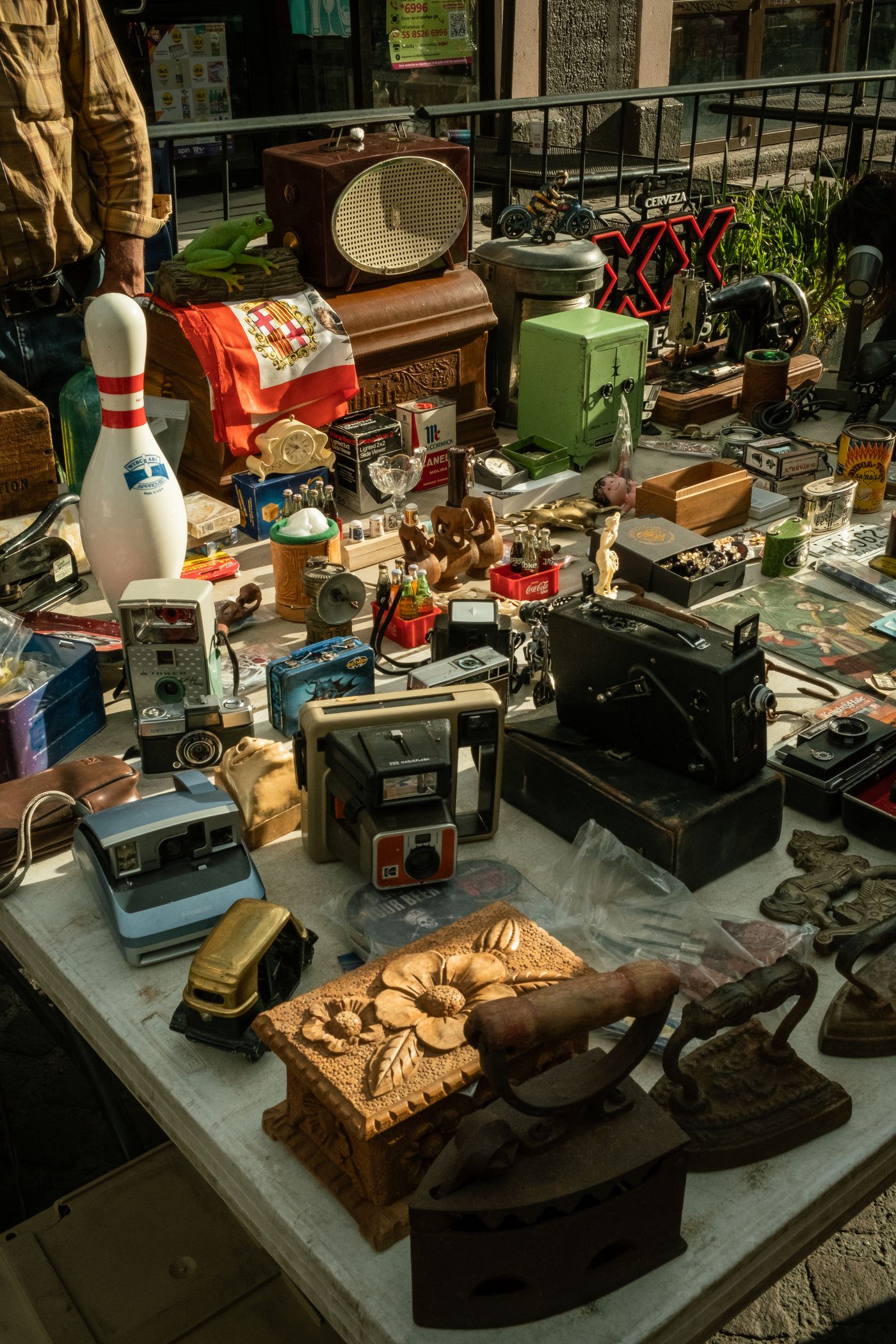 Second-hand objects displayed at a flea market