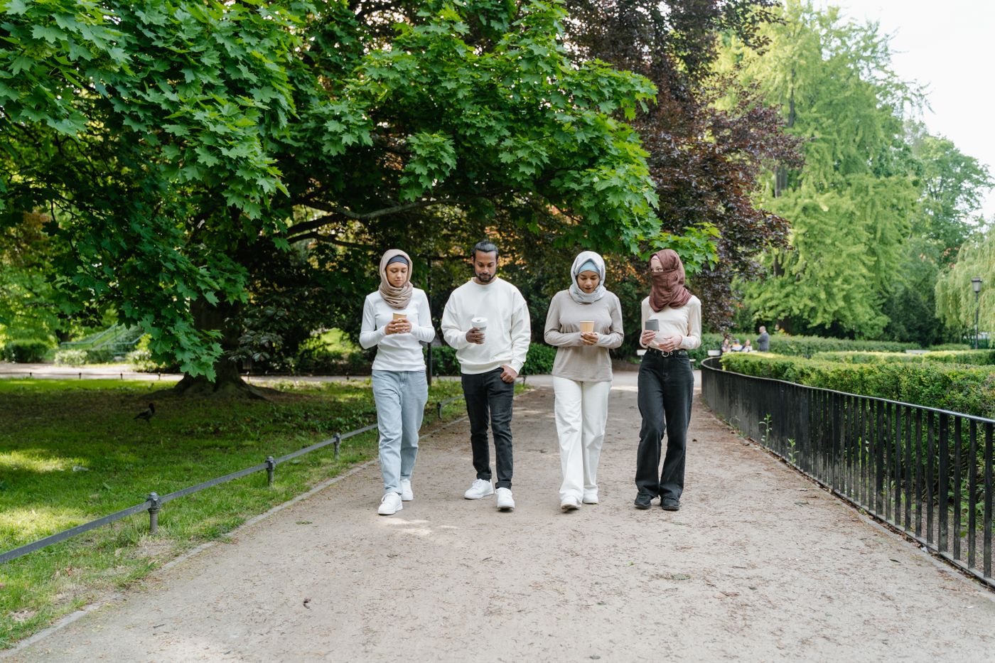 Friends walking together in a park