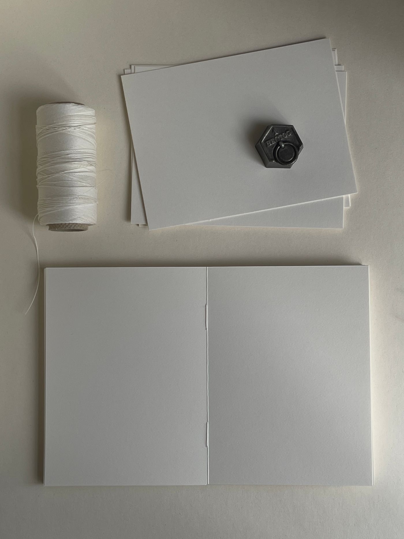 Making a notebook with paper and thread