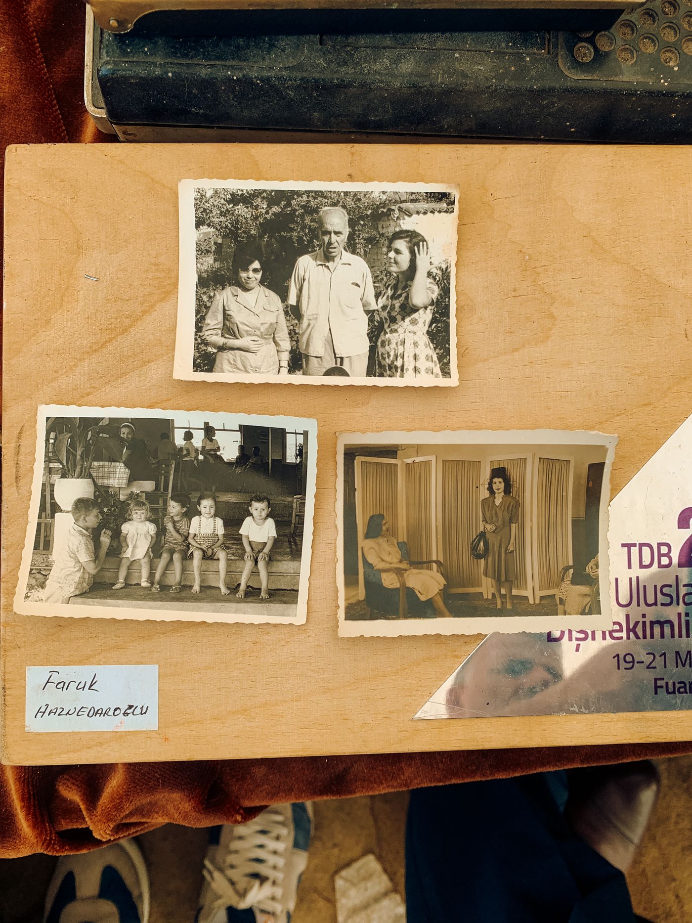 Old photographs gathered on a display board