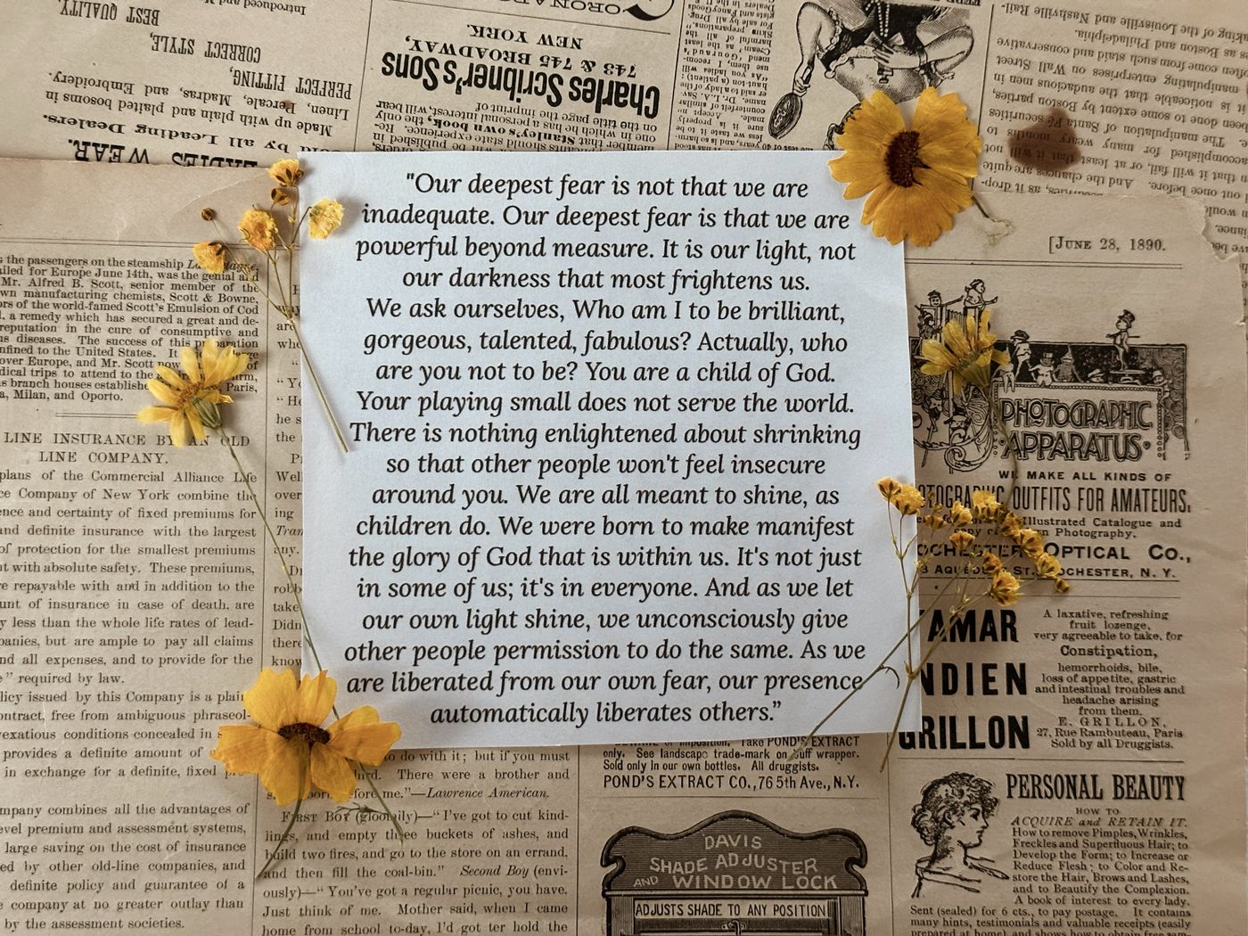 A card decorated with pressed yellow flowers