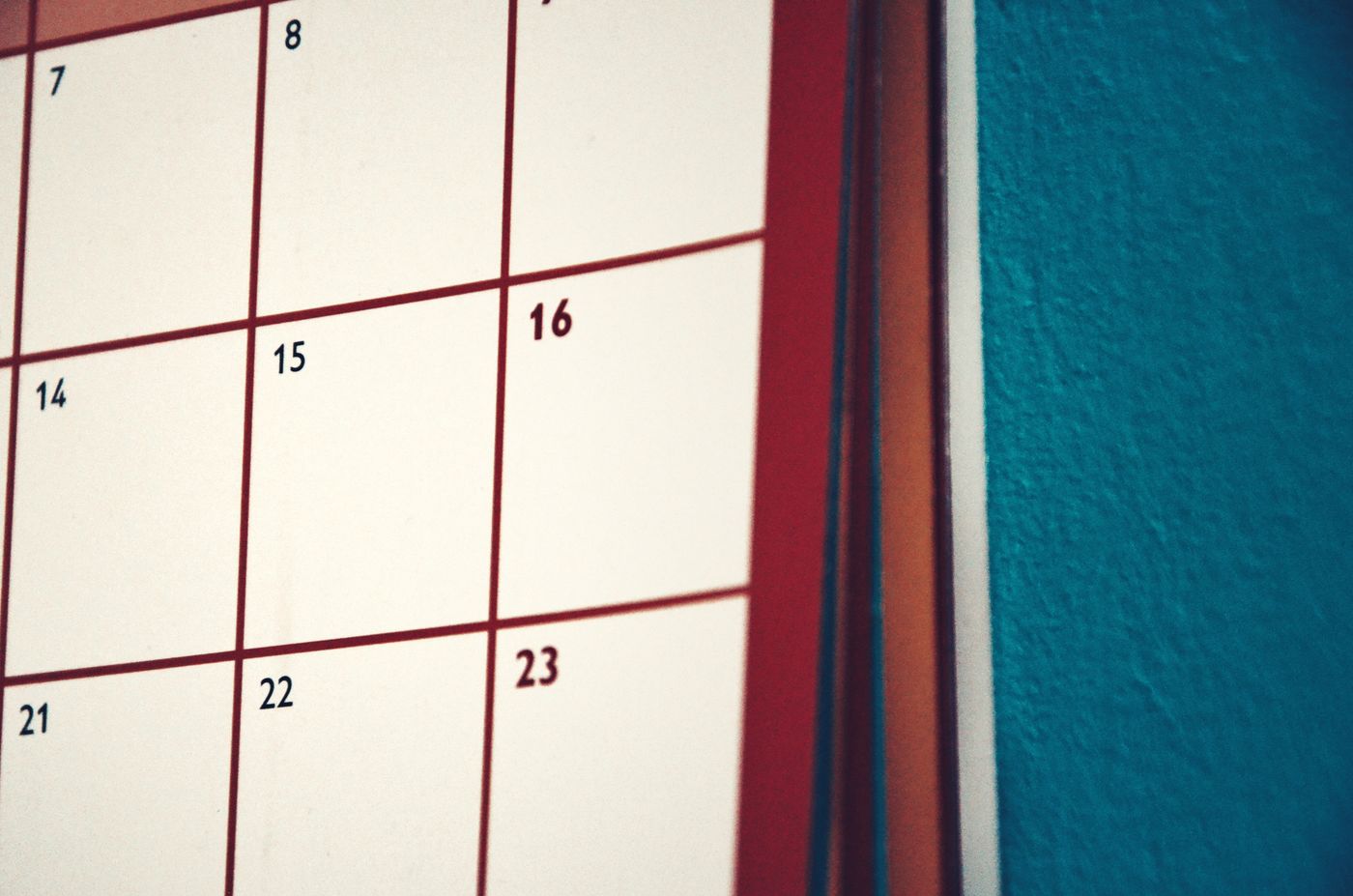 A calendar hanging on a wall